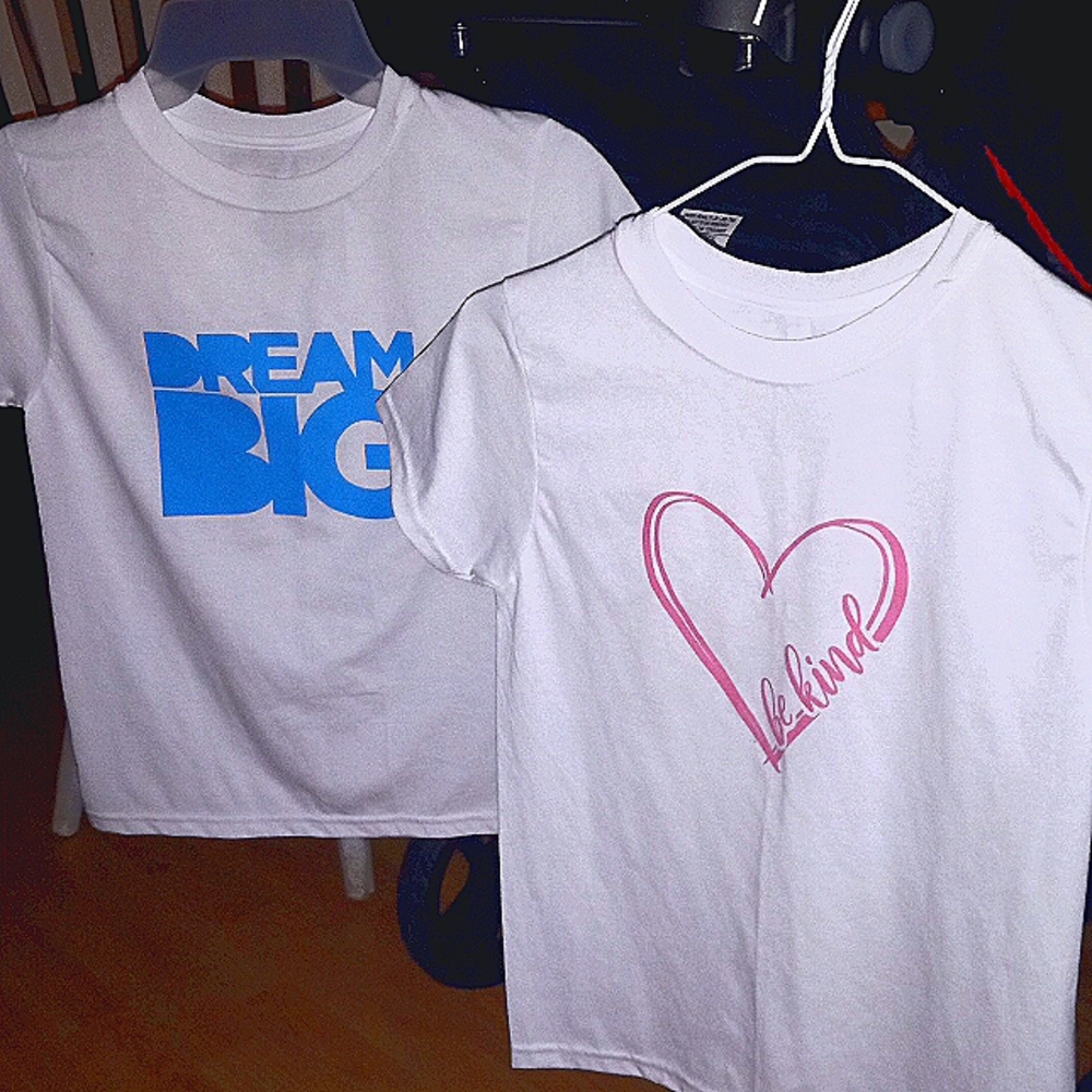 Two artistic shirts crafted right here at home. Dream big BE kind. Very cool